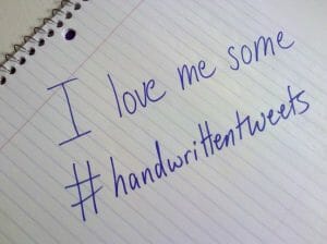 Photo of piece of paper that says 'I love handwritten tweets'